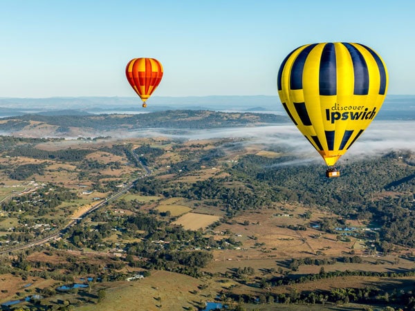 hot air balloons floating above Ipswich
