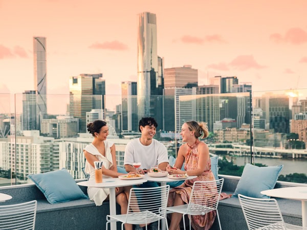 friends enjoying their time at Lina Rooftop, Brisbane
