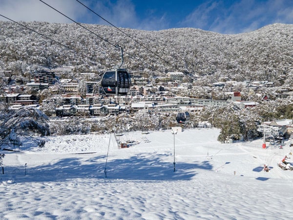 Drone shot of Thredbo village and mountain