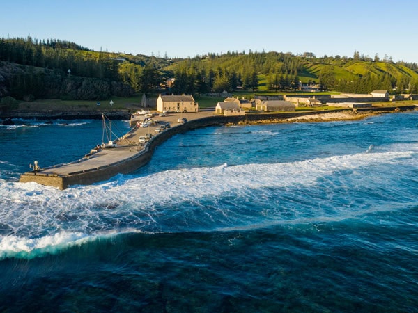 Aerial view of Norfolk Island's coastline and pier