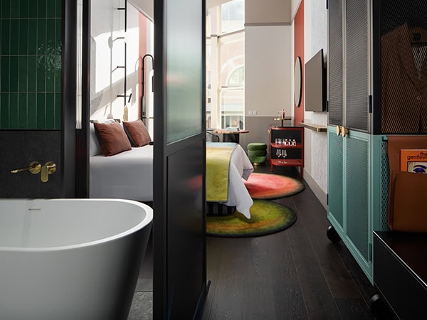 Deluxe king room interior at QT Newcastle