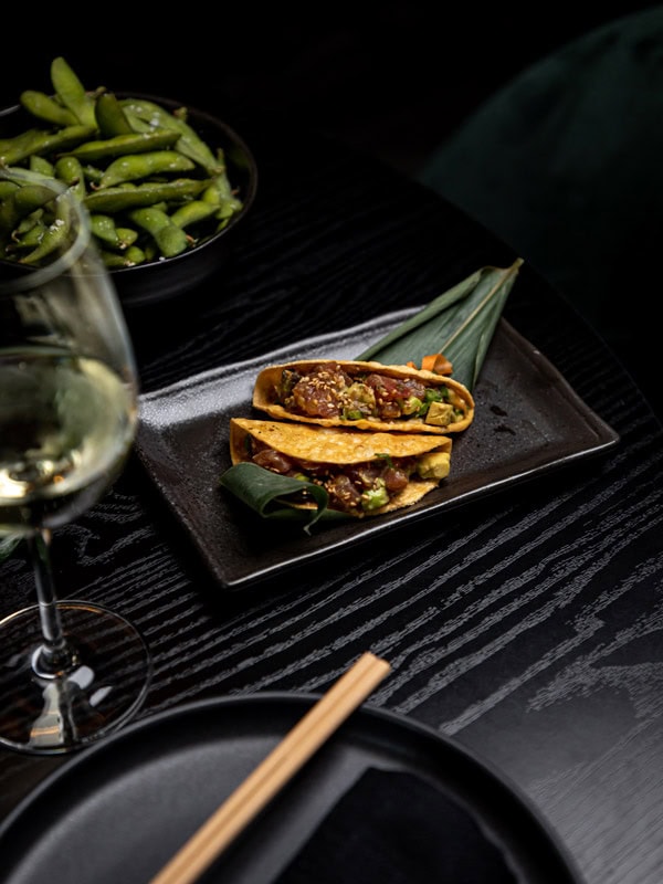 a plate of food with wine at SOKO Rooftop Bar & Restaurant, Brisbane