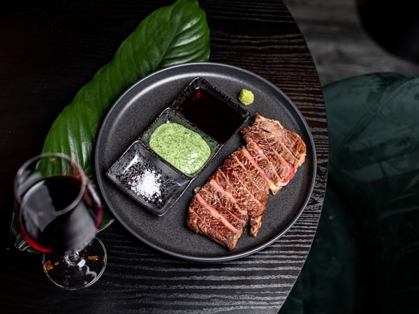 steak and wine at SOKO Rooftop Bar & Restaurant, Brisbane
