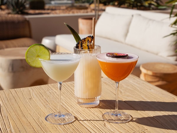 cocktail glasses on the table at Sunsets Rooftop, Brisbane