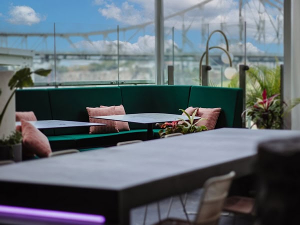 an al fresco seating area at The Aviary, Brisbane