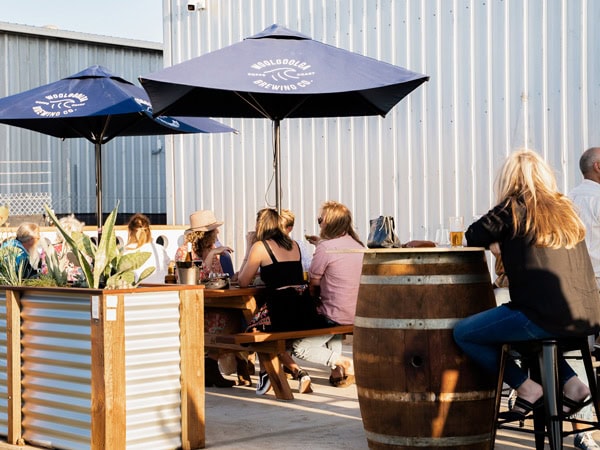 the al fresco spot with umbrellas at Woolgoolga Brewing Co.