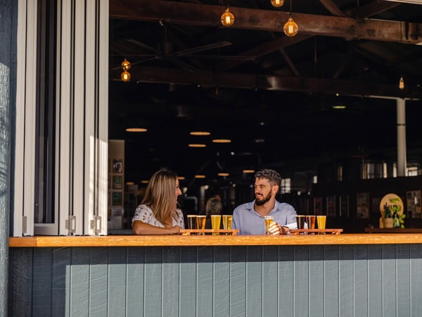 a couple drinking at Ballistic Beer Co.