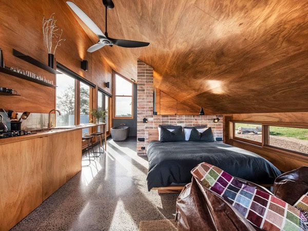the wooden bedroom interior at the Gawthorne’s Hut in Mudgee