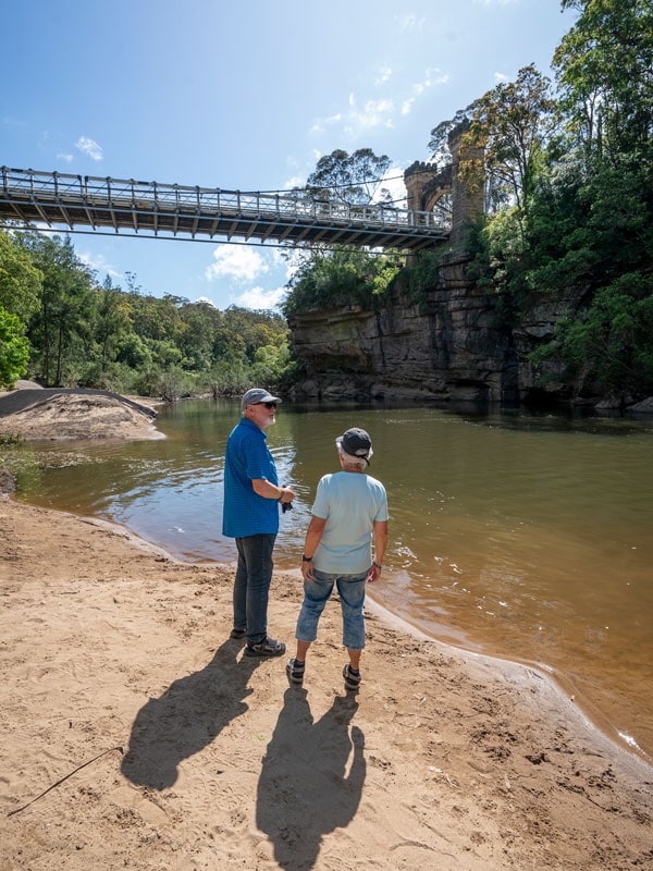 an old couple by the river at Kangaroo Valley Holiday Haven