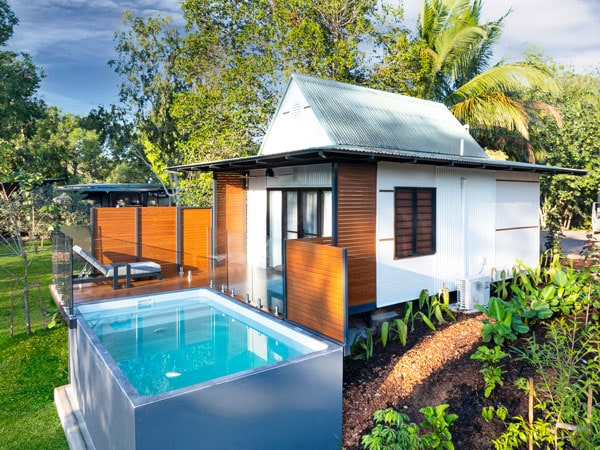 a luxury tropical villa with a plunge pool