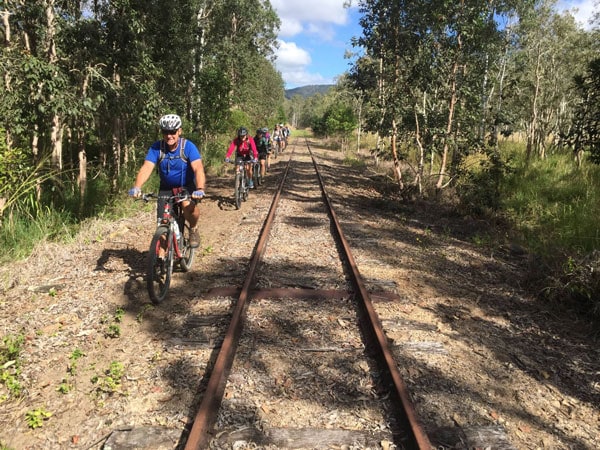 bikers passing by the Atherton Tablelands Rail Trail