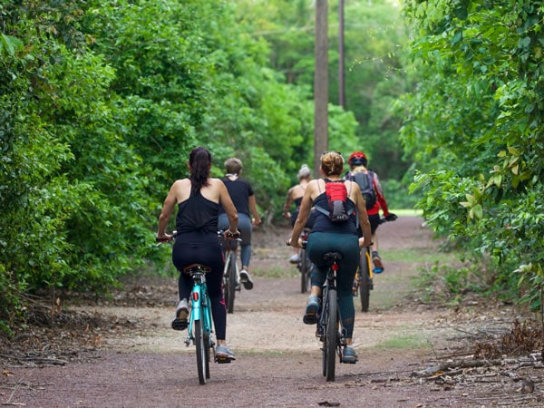 Cyclists on the East Point Science Trail in Darwin