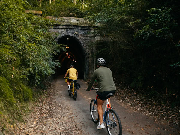 biking through a tunnel at Fernleigh Track