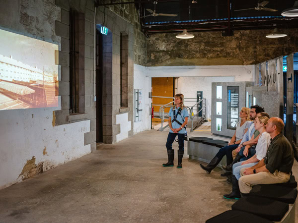 guests attending a briefing session before the tunnels tour at Fremantle Prison