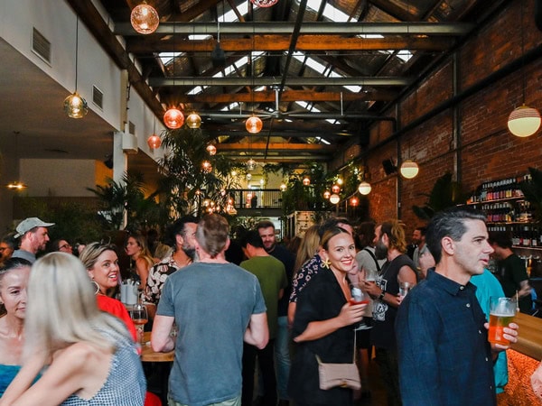 the crowded bar of H&C Urban Winery in Fremantle