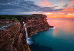 a scenic view of Curracurrong Falls at sunset
