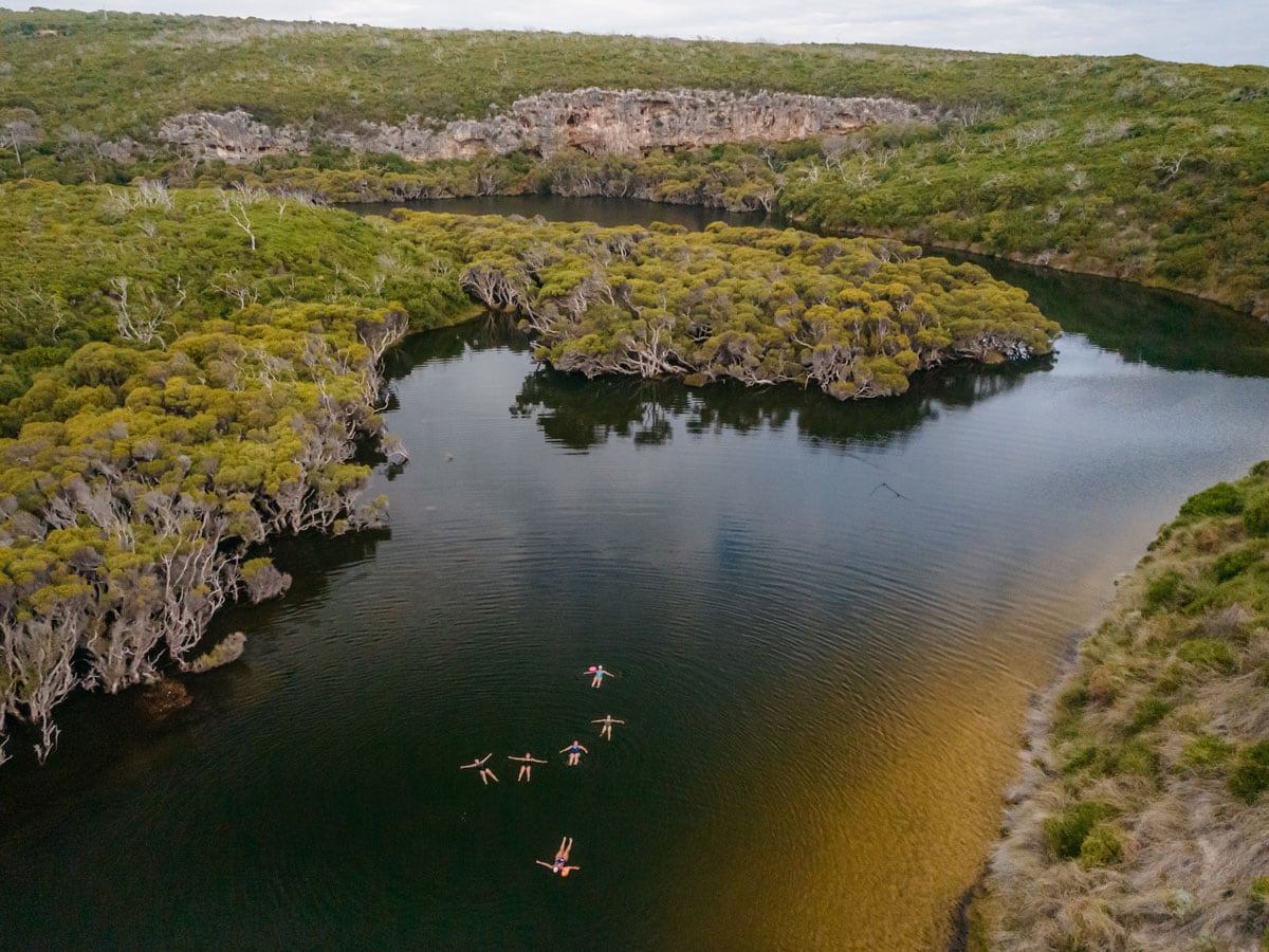 an aerial view of women floating above Margaret River