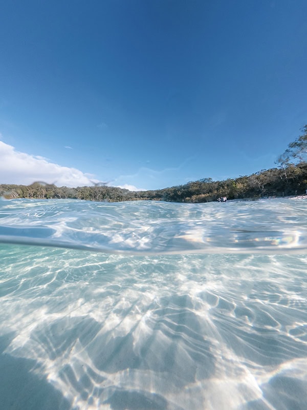 Lake McKenzie, famous for its pure silica sand and pristine, drinkable water.