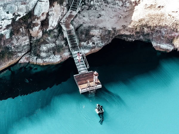 a diving platform above the milky turquoise waters of Little Blue Lake, Mount Gambier