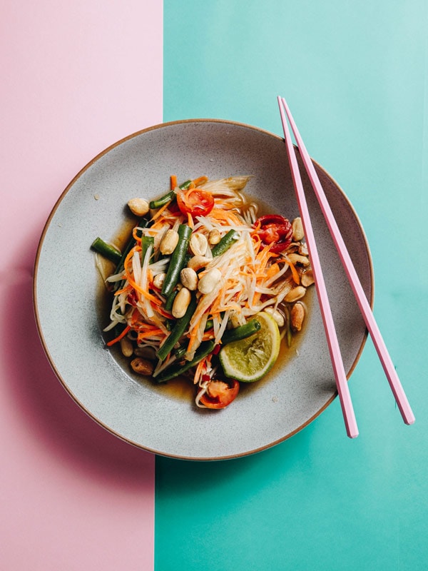 an Asian plate at Maew Maew on pink and blue-green background