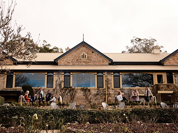 people dining outside of Mount Lofty House