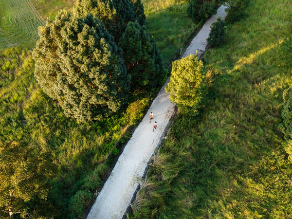 Aerial shot of Two people cycling the Northern Rivers Rail Trail