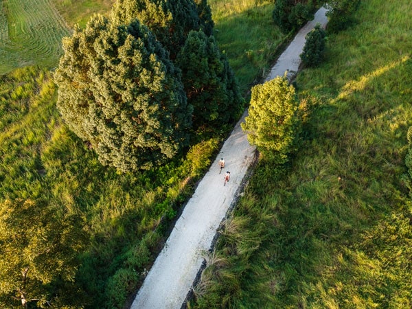 Northern Rivers Rail Trail aerial shot of two people cycling