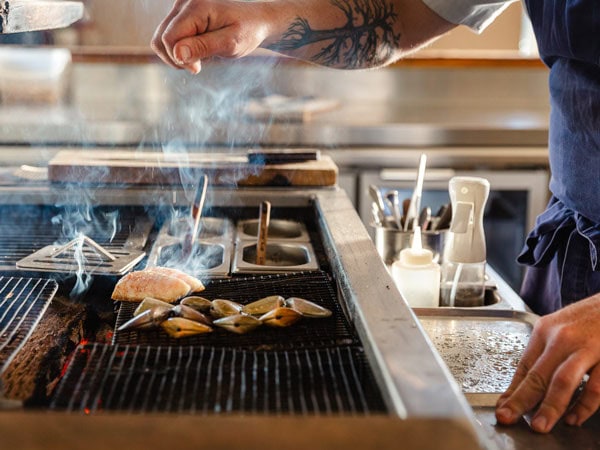 Ben Devlin cooking at Pipit