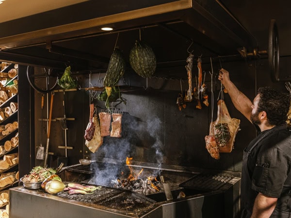 the act of preserving meat through smoking at Watervale Hotel