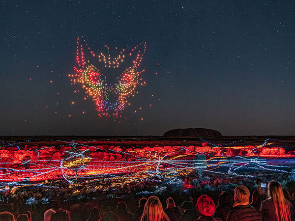 crowd watching Wintjiri Wiru light show at uluru