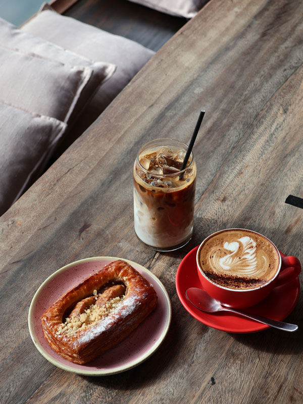 coffee and breakfast pastry at Elephant Cafe