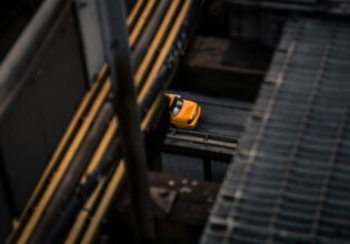 glimpse of a taxi crossing a bridge