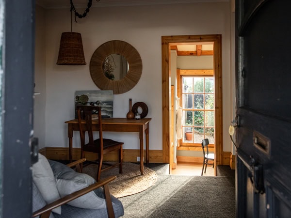 the vintage living room interior of Captains Cottage, Hobart