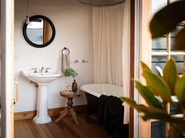 the ornate clawfoot tub at Captains Cottage, Hobart