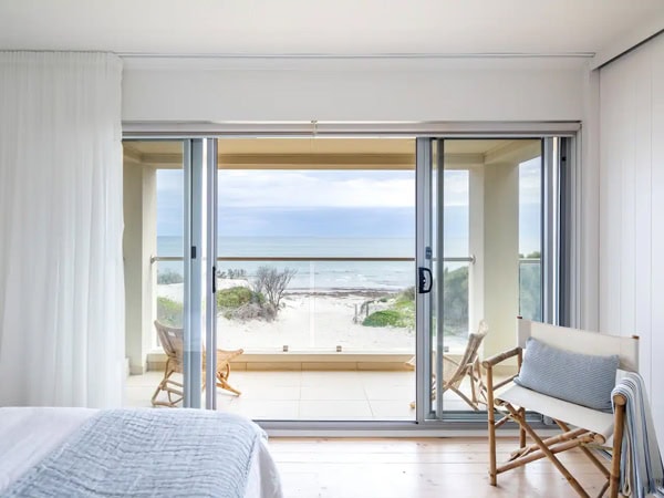 a bedroom with beachfront views in Semaphore Park