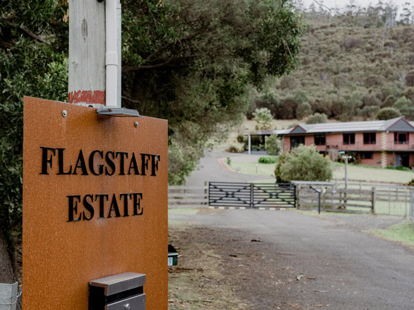 the Flagstaff Estate signage at the entrance