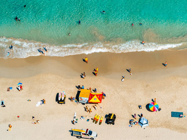 an aerial view of people on Leighton Beach