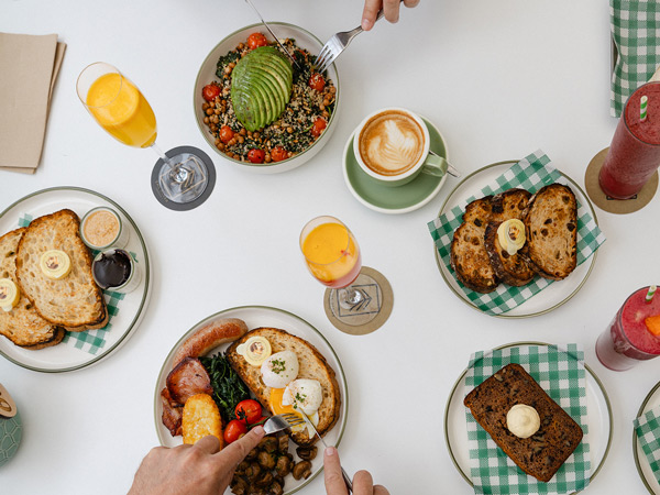 a table-top view of food and drinks at The Pines