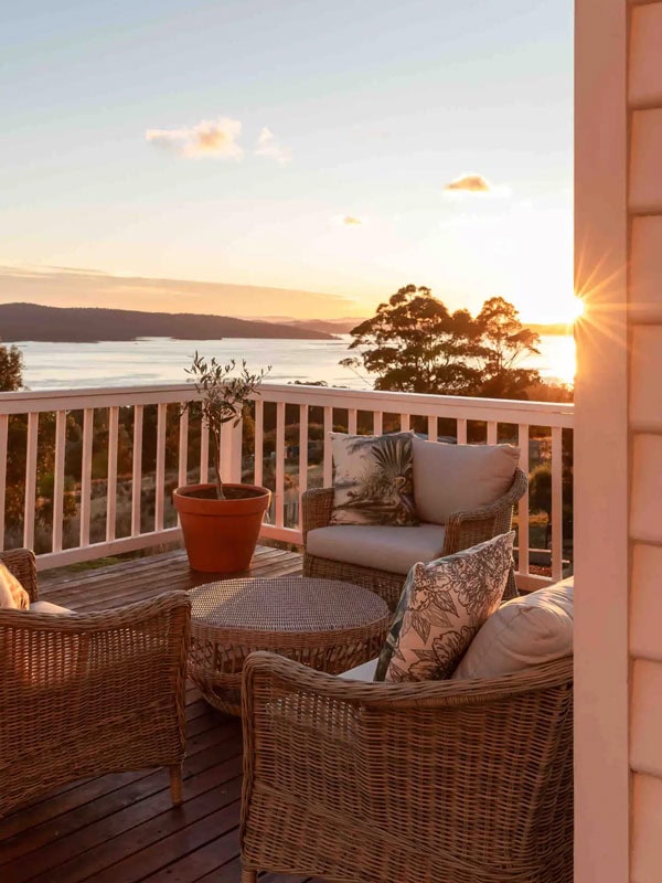 a private balcony with coastal views of Birchs Bay at Wayward Mariner