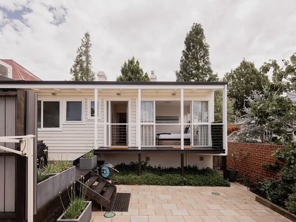 the property exterior and courtyard of West Hobart Cottage