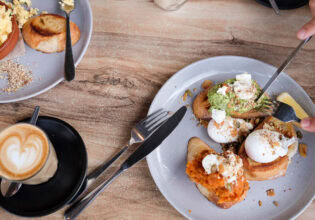 a plate of food with coffee at Bank Street + Co, Port Fairy