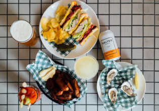 a spread of food on the table at The Clam, Lorne