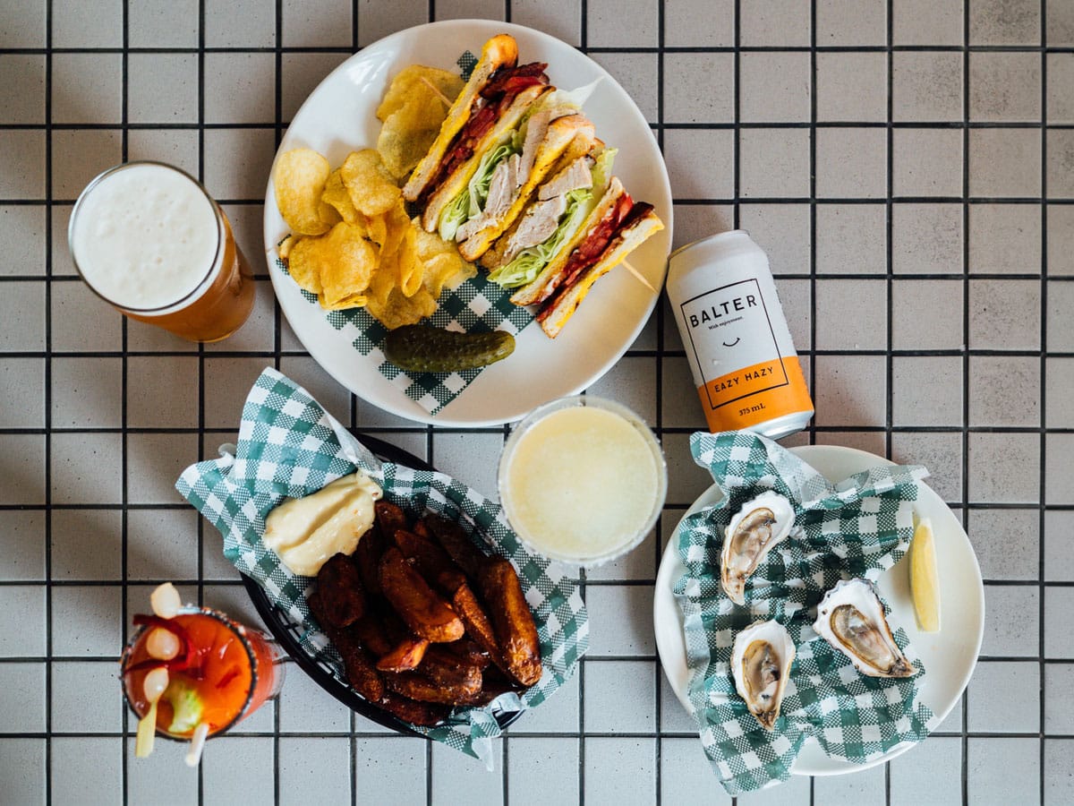 a spread of food on the table at The Clam, Lorne