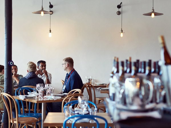 people dining inside IPSOS restaurant, Lorne