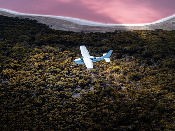 a helicopter flying above Lake Warden, Goldfields-Esperance, WA