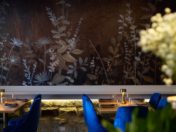 the dimly lit and sophisticated dining space at Madame Spice, Ettalong