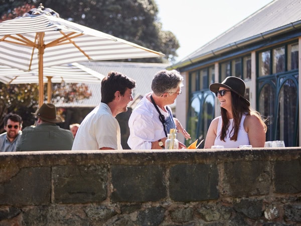 friends dining al fresco at Merrijig Kitchen, Port Fairy