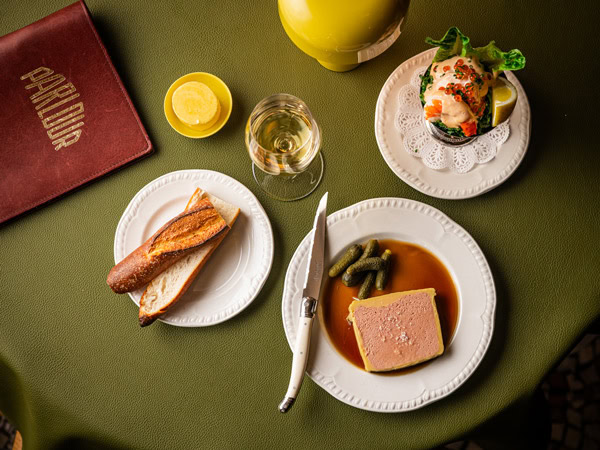 a table-top view of French cuisine at Parlour in QT Sydney