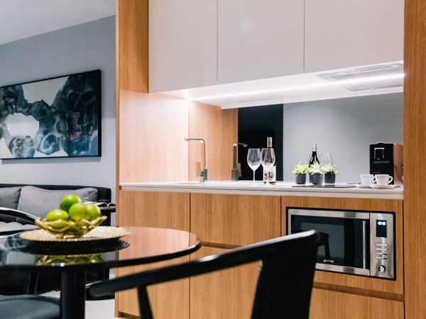 the dining and kitchenette at the SKYE Suites in Sydney