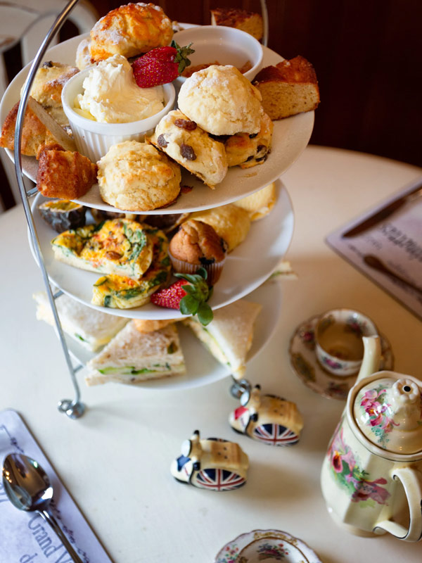 a three-tiered dessert stand at The Village Heritage B&B, Gold Coast high tea